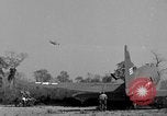 Image of Repair of U.S. C-46 aircraft with help of indigenous people Burma, 1944, second 40 stock footage video 65675052233