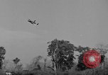 Image of Repair of U.S. C-46 aircraft with help of indigenous people Burma, 1944, second 43 stock footage video 65675052233
