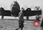 Image of Repair of U.S. C-46 aircraft with help of indigenous people Burma, 1944, second 52 stock footage video 65675052233