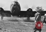 Image of Repair of U.S. C-46 aircraft with help of indigenous people Burma, 1944, second 53 stock footage video 65675052233