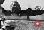 Image of Repair of U.S. C-46 aircraft with help of indigenous people Burma, 1944, second 54 stock footage video 65675052233