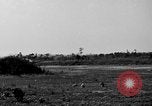Image of Repair of U.S. C-46 aircraft with help of indigenous people Burma, 1944, second 59 stock footage video 65675052233
