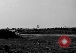 Image of Repair of U.S. C-46 aircraft with help of indigenous people Burma, 1944, second 60 stock footage video 65675052233