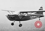 Standbild Stinson L-5 Sentinal Flugzeuge Birma, 1944, aus Sekunde 59 historischem Filmmaterial Videoclip 65675052235