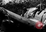 Image of wreckage of Japanese plane Burma, 1944, second 10 stock footage video 65675052238