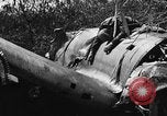 Image of wreckage of Japanese plane Burma, 1944, second 11 stock footage video 65675052238
