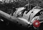 Image of wreckage of Japanese plane Burma, 1944, second 15 stock footage video 65675052238