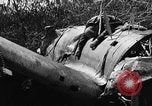 Image of wreckage of Japanese plane Burma, 1944, second 16 stock footage video 65675052238