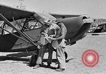 Image of L-5 plane Burma, 1945, second 5 stock footage video 65675052248