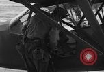 Standbild US Army Piloten fliegen Stinson L-5 Sentinal Flugzeug Palawan Philippinen, 1945, aus Sekunde 12 historischem Filmmaterial Videoclip 65675052254