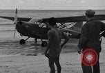 Standbild US Army Piloten fliegen Stinson L-5 Sentinal Flugzeug Palawan Philippinen, 1945, aus Sekunde 19 historischem Filmmaterial Videoclip 65675052254
