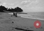 Standbild US Army Piloten fliegen Stinson L-5 Sentinal Flugzeug Palawan Philippinen, 1945, aus Sekunde 38 historischem Filmmaterial Videoclip 65675052254