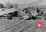 Image of Crashed Piper Cub (L-4) airplane prepared for towing Italy, 1944, second 48 stock footage video 65675052267