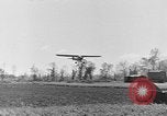 Image of Crashed Piper Cub (L-4) airplane prepared for towing Italy, 1944, second 55 stock footage video 65675052267
