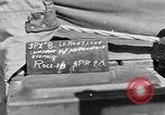 Image of Inverted US Army Stinson L-5 plane on field Italy, 1944, second 7 stock footage video 65675052268