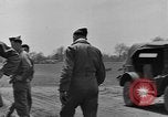 Image of Inverted US Army Stinson L-5 plane on field Italy, 1944, second 10 stock footage video 65675052268