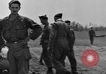 Image of Inverted US Army Stinson L-5 plane on field Italy, 1944, second 11 stock footage video 65675052268