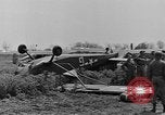 Image of Inverted US Army Stinson L-5 plane on field Italy, 1944, second 23 stock footage video 65675052268
