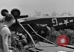 Image of Inverted US Army Stinson L-5 plane on field Italy, 1944, second 30 stock footage video 65675052268