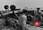 Image of Inverted US Army Stinson L-5 plane on field Italy, 1944, second 34 stock footage video 65675052268