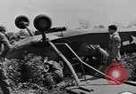 Image of Inverted US Army Stinson L-5 plane on field Italy, 1944, second 35 stock footage video 65675052268