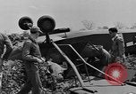 Image of Inverted US Army Stinson L-5 plane on field Italy, 1944, second 36 stock footage video 65675052268