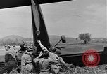 Image of Inverted US Army Stinson L-5 plane on field Italy, 1944, second 44 stock footage video 65675052268
