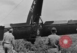Image of Inverted US Army Stinson L-5 plane on field Italy, 1944, second 46 stock footage video 65675052268