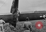 Image of Inverted US Army Stinson L-5 plane on field Italy, 1944, second 48 stock footage video 65675052268