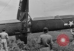 Image of Inverted US Army Stinson L-5 plane on field Italy, 1944, second 49 stock footage video 65675052268