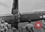 Image of Inverted US Army Stinson L-5 plane on field Italy, 1944, second 51 stock footage video 65675052268