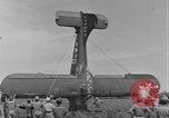 Image of Inverted US Army Stinson L-5 plane on field Italy, 1944, second 56 stock footage video 65675052268