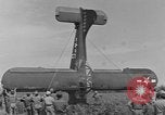 Image of Inverted US Army Stinson L-5 plane on field Italy, 1944, second 58 stock footage video 65675052268