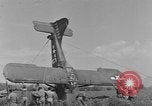 Image of Inverted US Army Stinson L-5 plane on field Italy, 1944, second 60 stock footage video 65675052268