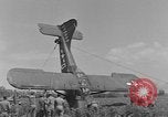 Image of Inverted US Army Stinson L-5 plane on field Italy, 1944, second 62 stock footage video 65675052268