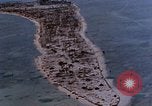Image of aerial view of Tarawa Atoll Tarawa Gilbert Islands, 1943, second 5 stock footage video 65675052289