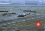 Image of UH-1B helicopter Saigon Vietnam, 1968, second 7 stock footage video 65675052341