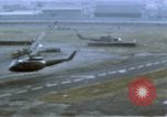 Image of UH-1B helicopter Saigon Vietnam, 1968, second 9 stock footage video 65675052341