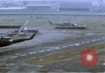 Image of UH-1B helicopter Saigon Vietnam, 1968, second 10 stock footage video 65675052341
