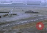 Image of UH-1B helicopter Saigon Vietnam, 1968, second 12 stock footage video 65675052341