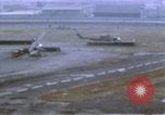 Image of UH-1B helicopter Saigon Vietnam, 1968, second 13 stock footage video 65675052341