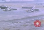 Image of UH-1B helicopter Saigon Vietnam, 1968, second 14 stock footage video 65675052341