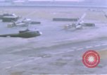 Image of UH-1B helicopter Saigon Vietnam, 1968, second 18 stock footage video 65675052341