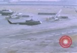Image of UH-1B helicopter Saigon Vietnam, 1968, second 19 stock footage video 65675052341