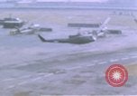 Image of UH-1B helicopter Saigon Vietnam, 1968, second 20 stock footage video 65675052341