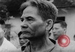 Immagine di Raduno nord vietnamita durante la guerra Il Vietnam, 1964, secondo 61 filmato di repertorio 65675052358