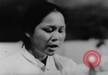 Image of Vietnam war protests North Vietnam, 1964, second 17 stock footage video 65675052360