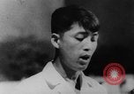 Image of Vietnam war protests North Vietnam, 1964, second 20 stock footage video 65675052360