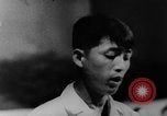 Image of Vietnam war protests North Vietnam, 1964, second 23 stock footage video 65675052360