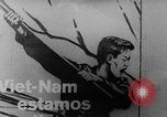 Image of Vietnam war protests North Vietnam, 1964, second 47 stock footage video 65675052360